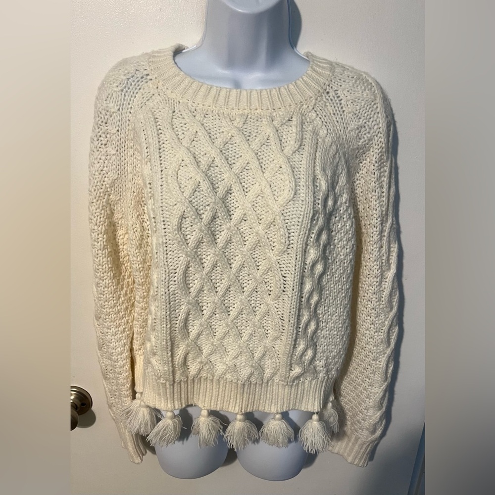 Hem & Thread  Size small Cream Cable Knit Sweater with tassels on bottom.